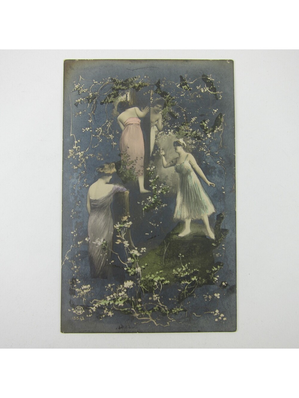 Postcard Risque Women Dresses Peek Around Trees Surrounded Flowers Antique 1908